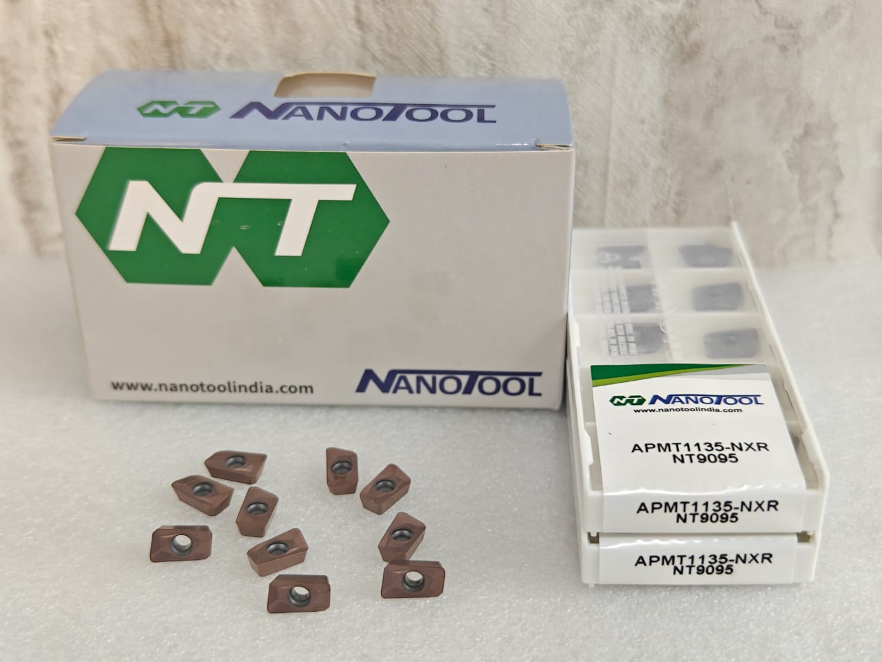 APMT1135-NXR NT9095 PVD grade = (APMT1135)
